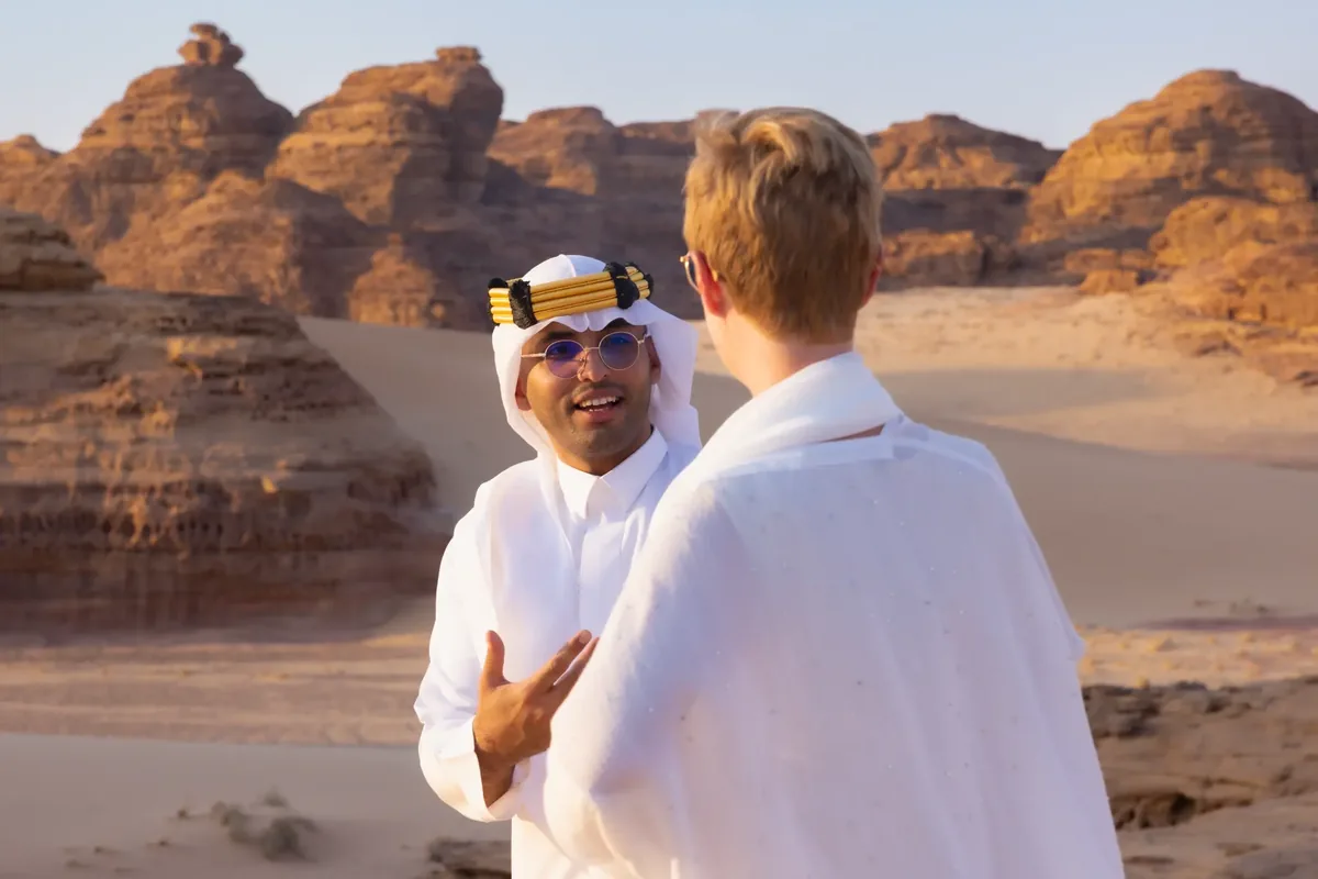 Abdullah with guests during a cultural experience in AlUla